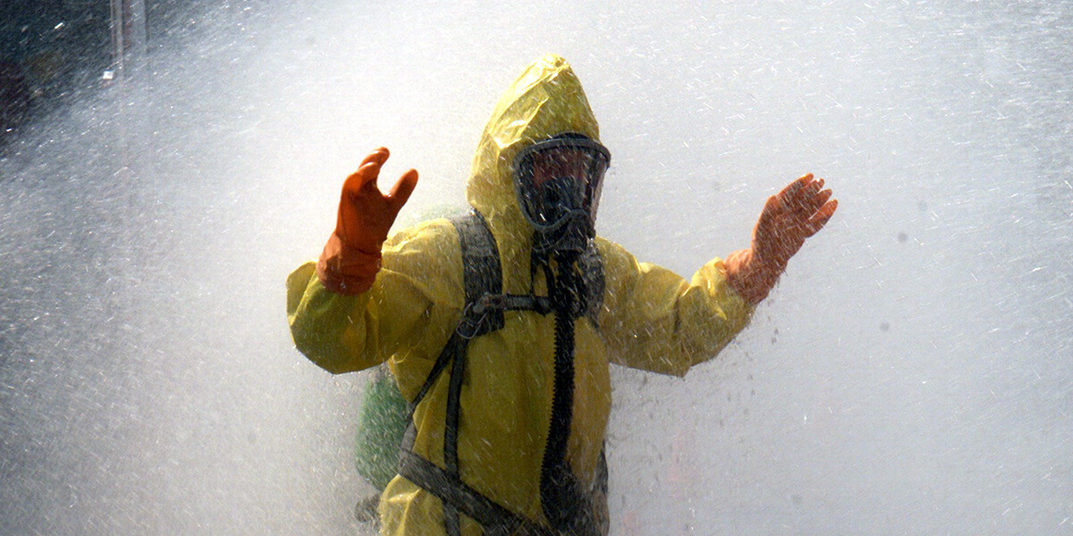 hazmat suit being decontaminated